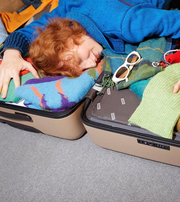 Packing for a Weekend Ski Trip Feels Impossible in a Carry On—Here’s What We Recommend.